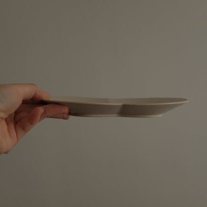 BLANCHETTE French Retro Ash White Two Petals Small Dish Plate Ceramic Underglazed Powdered Glaze Stoneware hand holding 