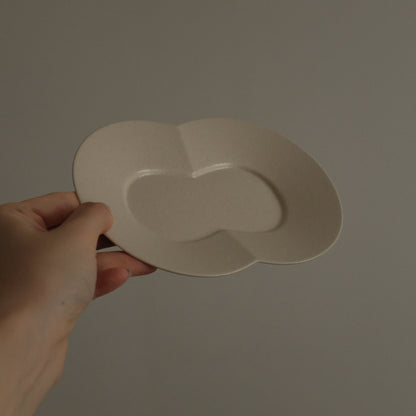 BLANCHETTE French Retro Ash White Two Petals Small Dish Plate Ceramic Underglazed Powdered Glaze Stoneware hand holding 