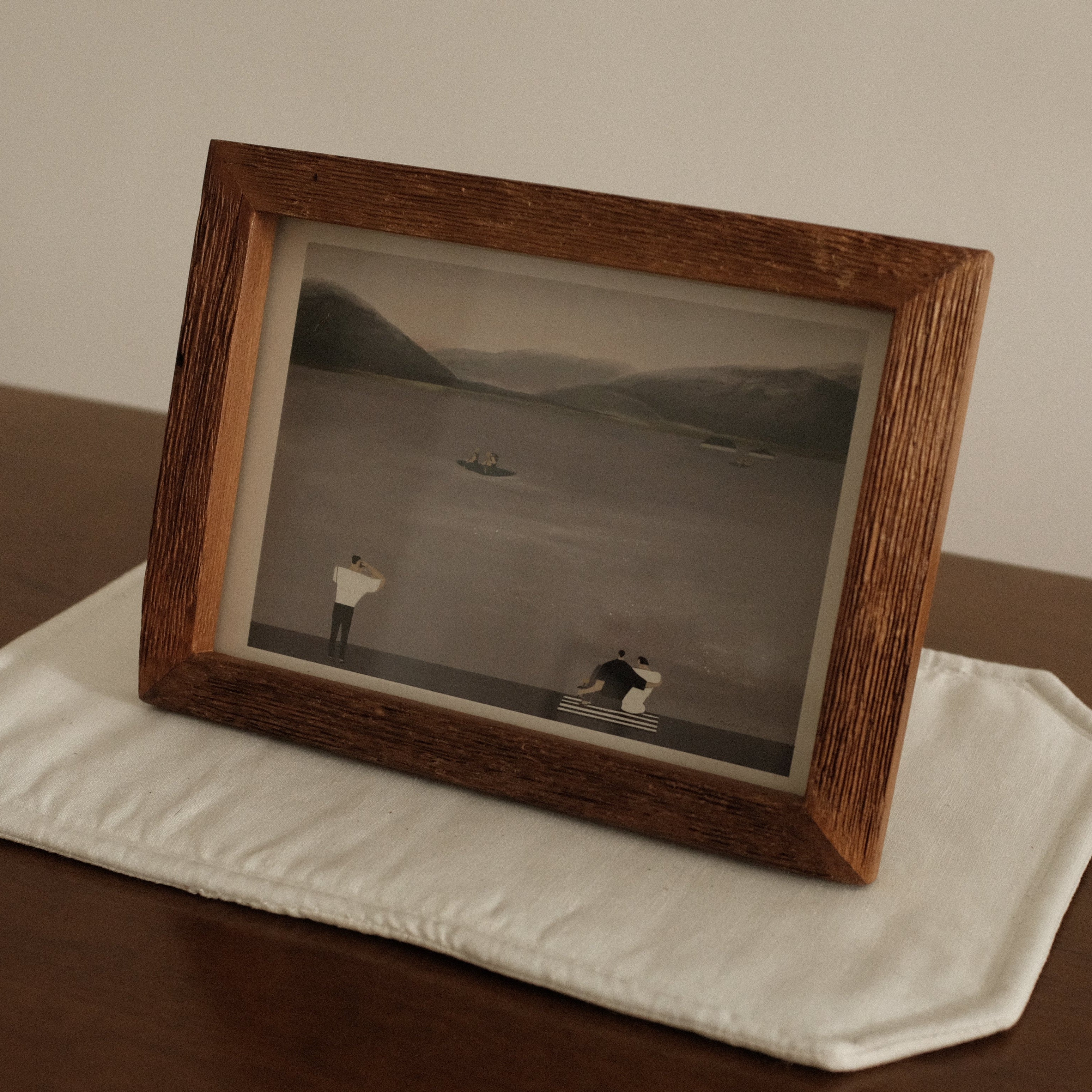 Teak Wood Framed Leisure by the Lake black and white photograph of a landscape with two figures on a wooden surface.